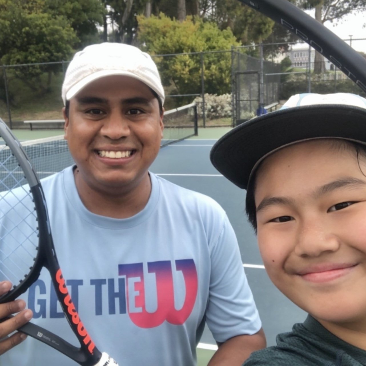 Julio with a junior student